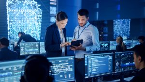 security professionals in room with computers